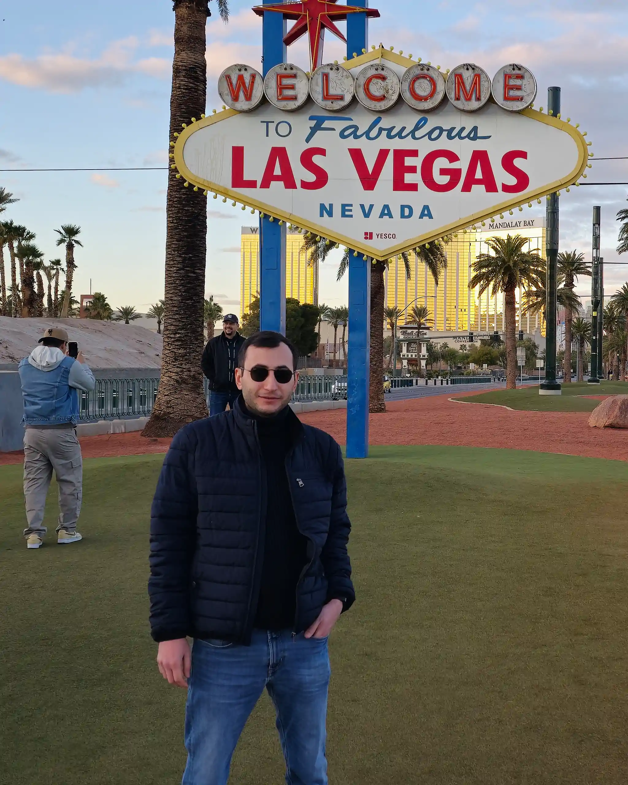 Levan Kelesidis in front of Welcome to Fabulous Las Vegas Sign